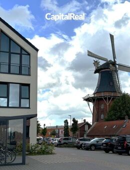 Wohnen am Norder Tief: Schöne Erdgeschosswohnung mit Blick auf die Mühle - Norden