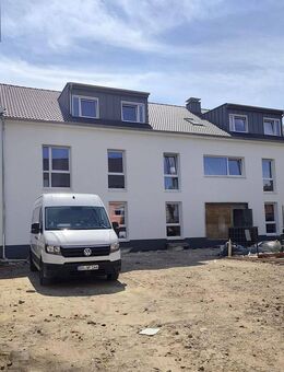 Familienwohnen = Neubau-Eigentumswohnung im EG mit Süd-Terrasse und Garten - Dortmund