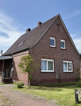 Zentrales Wohnen: Einfamilienhaus mit Einliegerwohnung für vielseitige Nutzung - Ostrhauderfehn