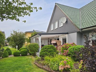 Vielseitiges Zuhause: Einfamilienhaus mit integrierter Gewerbemöglichkeit