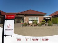 Ebenerdiges Wohnen mit Extra-Komfort - Bungalow mit Wintergarten, Gartenidylle & Einliegerpotenzial. - Haren (Ems)