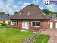 Ein gepflegtes Einfamilienhaus im Bungalowstil mit Garage - Aurich