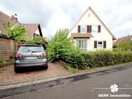 BERK Immobilien - Gepflegtes Siedlungshaus mit schönem Garten und Garage in bester Wohnlage - Stockstadt (Main)