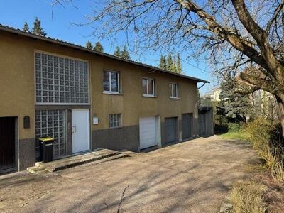 Großzügiges Einfamilienhaus mit schönem Garten und 4 Garagen, Eppelborn