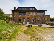 Freistehendes Zweifamilienhaus mit Lagerhallen in ruhiger Lage von Kreuzau-Bilstein - Kreuzau