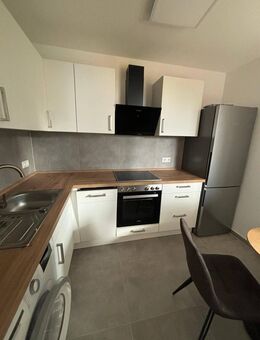 Ruhig und doch verkehrsgünstig gelegene 2 Zimmer Wohnung - Frankfurt (Main)