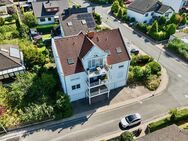 Niedernhausen: Eine schöne 3-Zimmerwohnung mit Balkon, Garten und 2 Stellplätzen - Niedernhausen