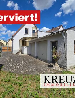 Kleines Einfamilienhaus mit 2 Garagen in zentraler Stadtlage, renovierungsbedürftig - Groß Gerau