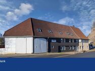 Mehrfamilienhaus mit drei vermieteten Wohnungen, zwei Garagen, Garten & Scheune! - Verhandlungsbasis - Herzberg (Harz)