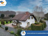 VR IMMO: Gemütliches Einfamilienhaus mit großer Terrasse und Doppelgarage in Burbach-Wahlbach! - Burbach (Nordrhein-Westfalen)