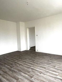 Charmante Eigentumswohnung in Wolfen - modernisiert, ruhig gelegen und sofort bezugsfrei - Bitterfeld-Wolfen