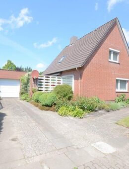 Solides Einfamilienhaus mit Garten, Garage und Potenzial in ruhiger Lage von Heide - Heide