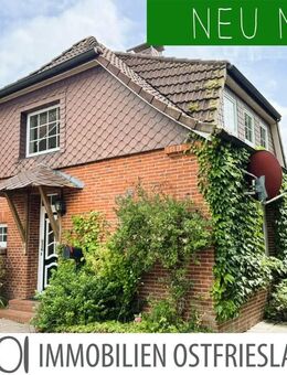 Charmantes Reihenmittelhaus mit Terrasse und Garten in ruhiger und küstennaher Lage - Krummhörn