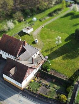 Gebäudeensemble mit drei Wohnhäusern und Bebauungsmöglichkeit - Kottweiler-Schwanden