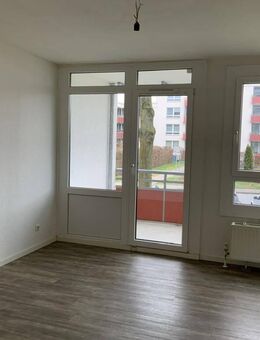 Perfekt für Mieter 50+ Hochparterre-Wohnung mit Balkon und optionalem Tiefgaragenplatz - Monheim (Rhein)