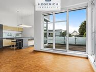 HEGERICH: Maisonette-Wohnung mit Dachterrasse + Balkone - München