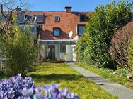 Maikäfersiedlung: Charmantes Reihenhaus mit Wintergarten und idyllischem Garten - München