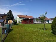 Familien und Anleger aufgepasst: Zweifamilienhaus in Ortsrandlage in Mainnähe Preis auf Anfrage - Faulbach