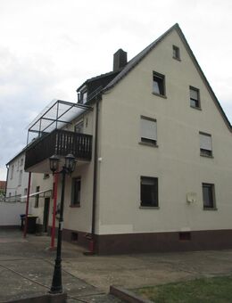Dreifamilienhaus auf teilbarem Grundstück mit bebaubarer Teilfläche für ein weiteres Wohnhaus.Mögliche Jahresmieteinnahme 16.320,00 € in Bergrheinfeld - Bergrheinfeld