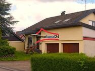 Attraktives Zweifamilienhaus – Wohnen und Vermieten unter einem Dach in 78554 Aixheim - Aldingen