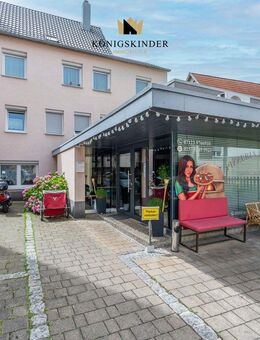 Gut vermietetes Wohn- und Geschäftshaus: Sanierte Wohneinheiten & Ladenlokal in Neuhausen - Metzingen