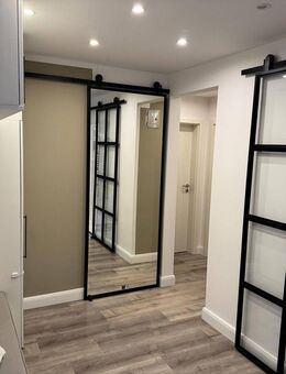 Traumhaft sanierte 3-Zimmer- Eigentumswohnung in beliebter Lage von Ahrensburg - Ahrensburg