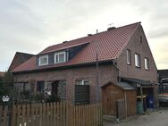 Mehrfamilienhaus mit Werkstatt und Garagen - Woltersdorf (Niedersachsen)