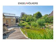 Engel & Völkers: Attraktiver Bungalow mit Traumgarten am Rand von Siegburg! - Neunkirchen-Seelscheid