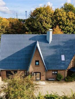 Großzügiges Architektenhaus mit Einliegerwohnung, Souterrain & parkähnlichem Grundstück in Mildstedt - Mildstedt