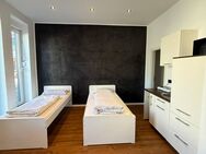 CITYGOLD-LIVING - Bis zu 7% Rendite - Exklusives Boarding-Erdgeschossapartment im Zentrum Germering - Germering