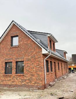 Esens - ruhige Innenstadt-Lage: Neubau Eigentumswohnung im Erdgeschoss mit Terrasse - Esens