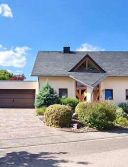 Attraktives Einfamilienhaus mit großzügigem Raumkonzept in familienfreundlicher Umgebung - Tawern