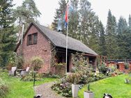 Einfamilienhaus auf großem Grundstück mit Doppelcarport und Nebengebäuden in Hatten/ Munderloh - Hatten