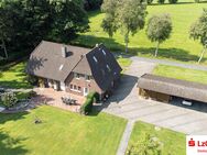 Wohnhaus mit zwei Einheiten in idyllischer Lage mit Gartenteich - Apen