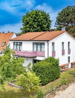 HEGERICH: Zeitgemäßes Wohnen in einem gepflegten Einfamilienhaus in Freimann mit Blick ins Grüne? - München
