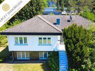 Einmalige Gelegenheit: Zeitloses Architektenhaus mit parkähnlichem Grundstück - Marktheidenfeld