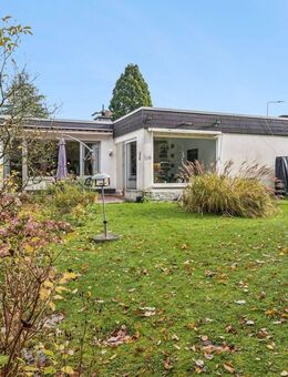 Attraktiver Bungalow in Kelkheim - gepflegte Immobilie mit Garten, Garage und soliden Mietern - Kelkheim (Taunus)