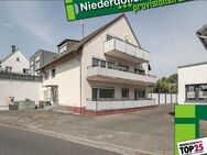 Attraktives Mehrfamilienhaus mit 6 Garagen in Niederdollendorf *provisionsfrei* - Königswinter