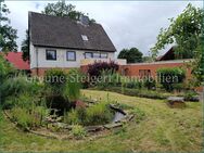 *** Familienhaus mit Souterrainwohnung mit großen Garten und 3 Garagen - Langenhagen