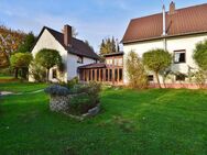 Einfamilienhaus mit Wintergarten und zusätzlichem Ferienhaus - Mandelbachtal