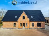 Kurz vor Fertigstellung! Ebenerdige Neubauwohnung mit Sonnenterrasse und Carport - Aurich