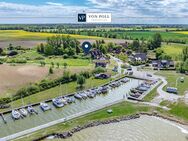 Tradition trifft auf Eleganz: Reetdachhaus mit separater Einliegerwohnung am Wasser - Saal