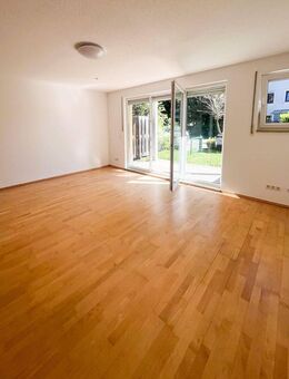 Bezugsfreie 2-Zimmer-Wohnung im Erdgeschoss mit Terrasse und kleinem Garten - Feldkirchen (Regierungsbezirk Oberbayern)