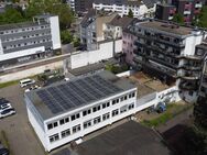 Eigennutz und/oder Kapitalanlage!:Betriebsgebäude mit Büro, 3 Wohnungen und Ladenlokalen - Leverkusen
