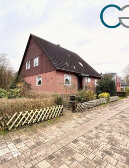 Gemütliches Einfamilienhaus in ansprechender Wohnlage mit großem Garten, Teich und Garage! - Nienburg (Weser)