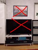 Schrankwand weiß Hochglanz mit Glastüren schwarz abgesetzt. in 22045