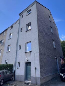 Vierfamilienhaus mit großem Garten sowie vier Garagen und einem Carport in zentraler Lage! - Herten