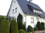 Erwitte- Einfamilienhaus mit Einliegerwohnung, Garage und schönem Garten - Erwitte