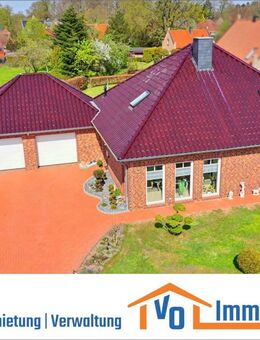 Wohnen, wo andere Urlaub machen: Neuwertiger Bungalow mit Doppelgarage unweit vom Timmeler Meer - Großefehn