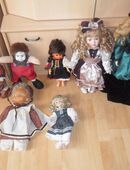 7 Sammlerpuppen mit Kleider versch Modelle in 66540